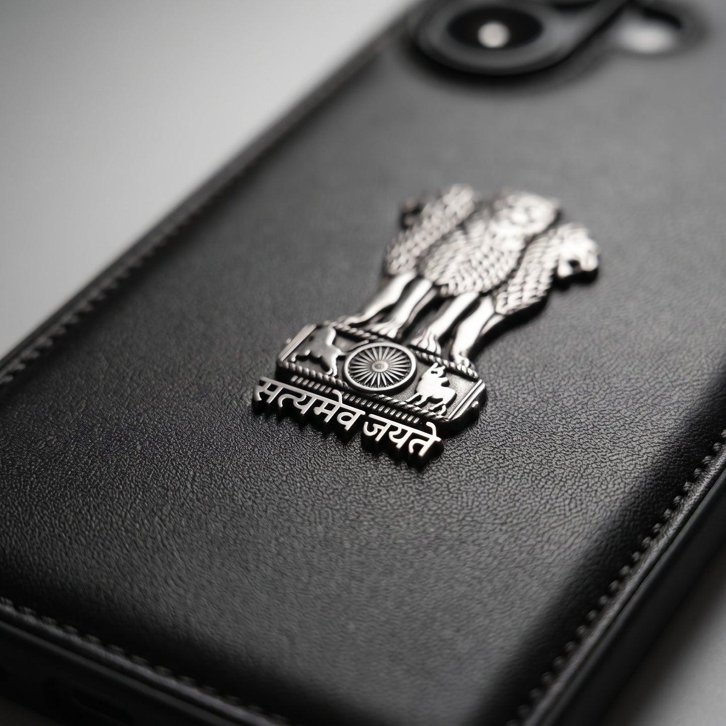 iPhone 16 Series 5G Skin Feel Leather Metal Satyamev Jayate Emblem Case